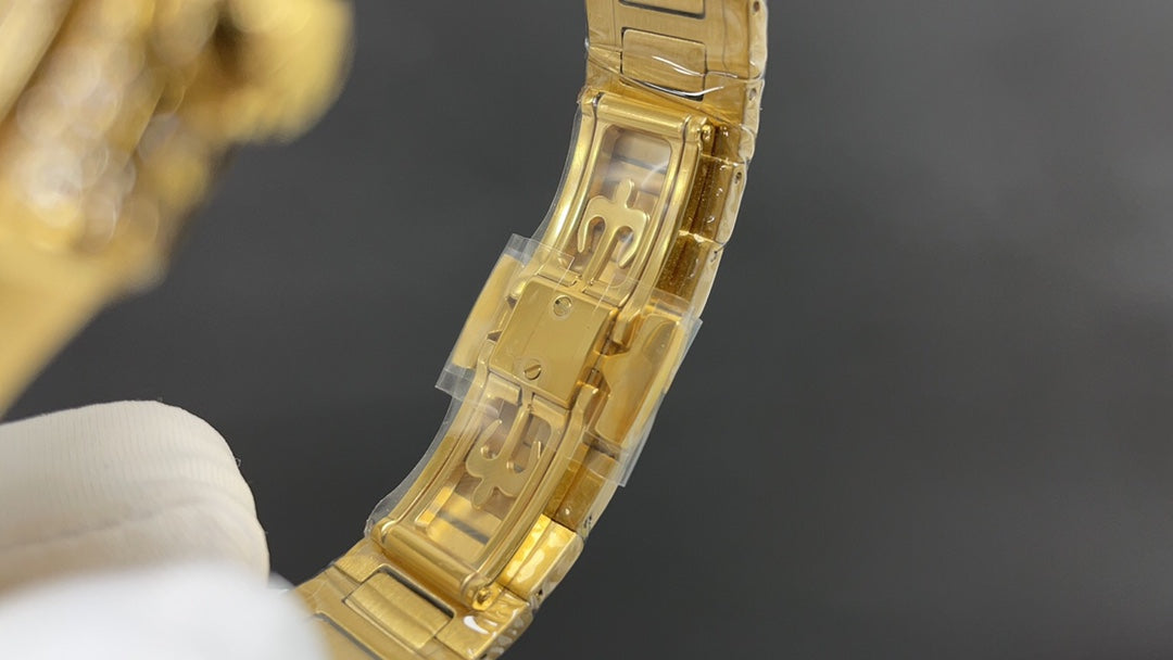 Patek Philippe Nautilus 7010 – “Gold Iced Out” (aftermarket) — Patek Philippe